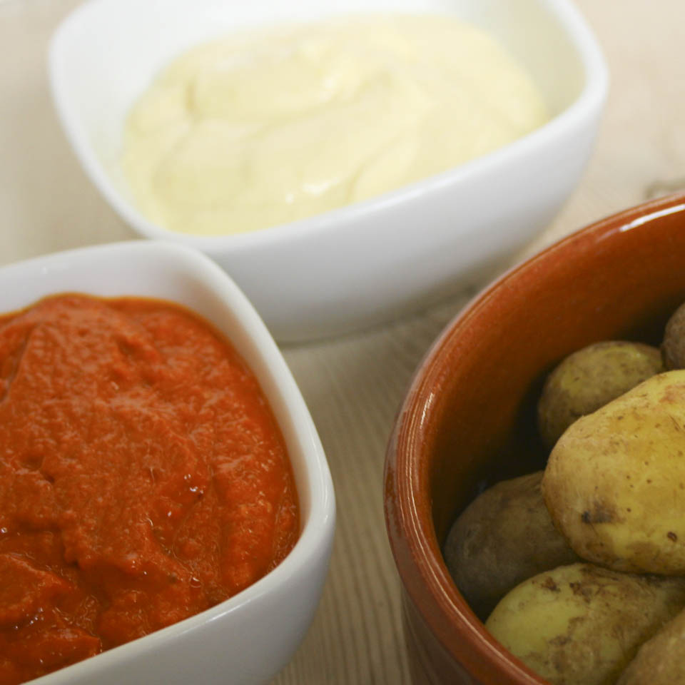 Wrinkled potatoes with chili and garlic dip