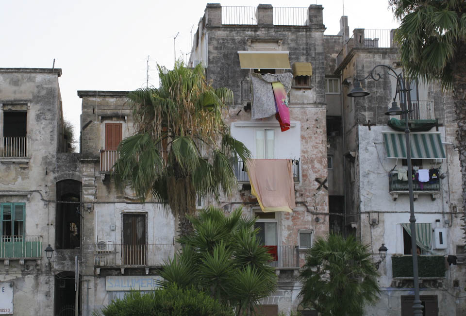 Old decaying houses in Taranto show the concrete side of Italy