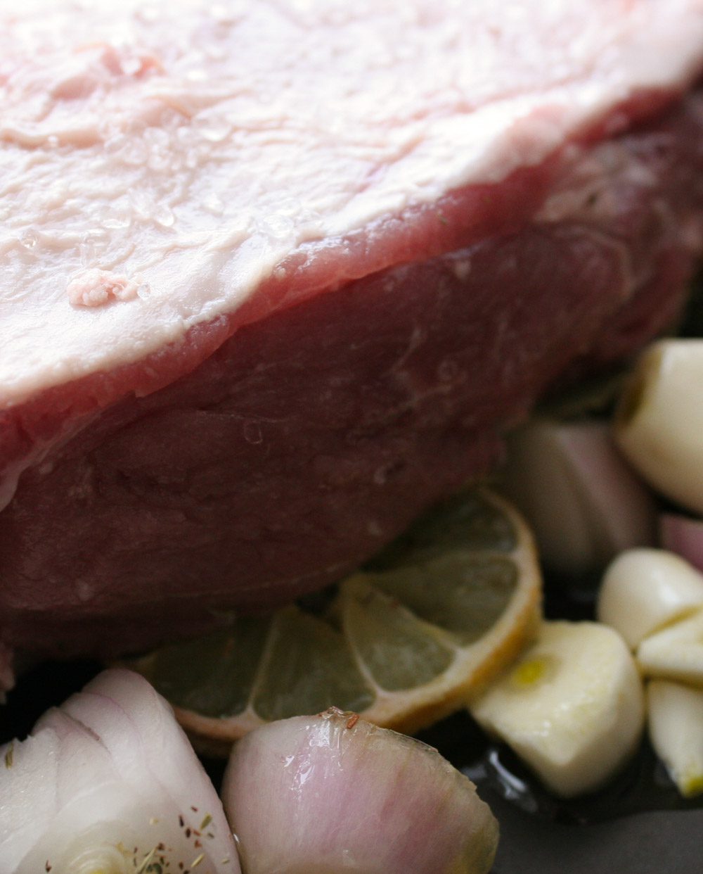 Slow roasted lamb with herbs and onions - Italian Notes