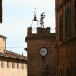 clock tower in montepulciano - Italian Notes