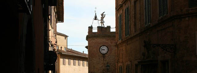 clock tower in montepulciano - Italian Notes