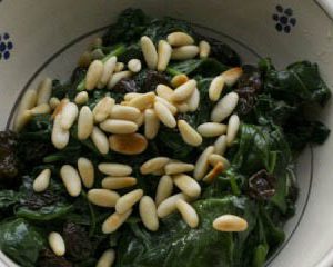 Image of spinach with raisins, garlic and pine nuts