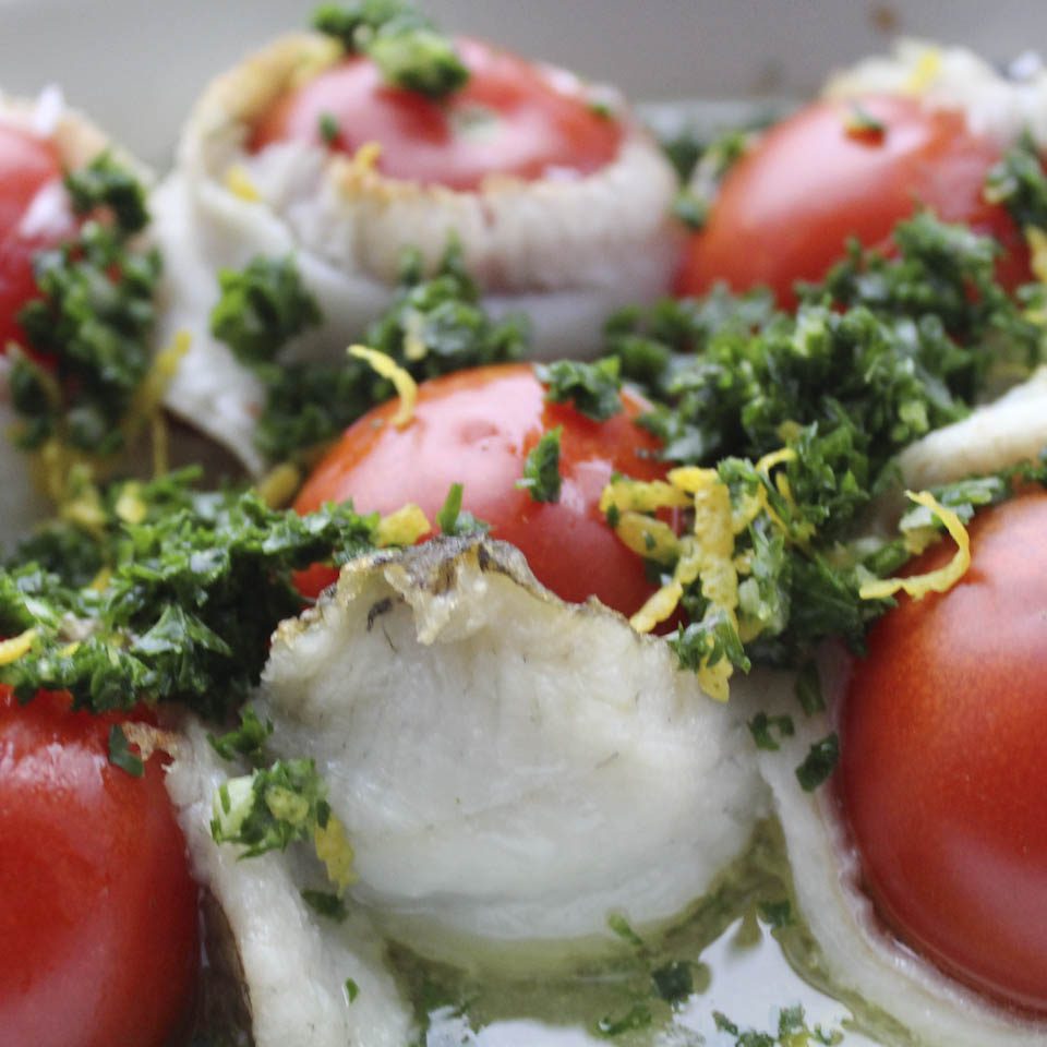Baked fish with tomatoes and gremolata