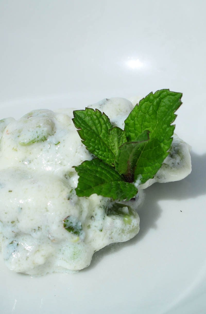 Fresh ricotta with fava beans and herbs