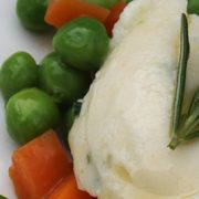 ricotta gnocchi with green peas and carrots