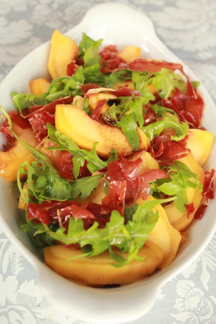 Delicious peach, arugula, cured ham salad Italian Notes