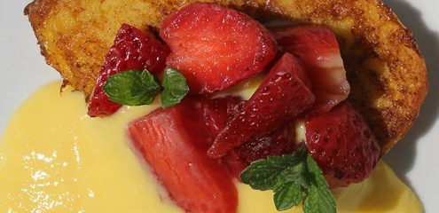 French toast with creme anglaise and strawberries