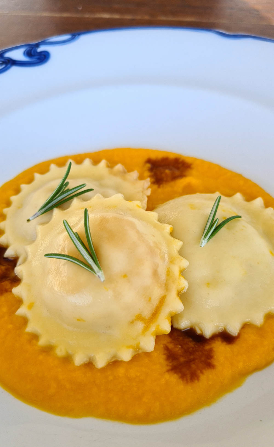 Raviolli with baccala and carrot sauce 
