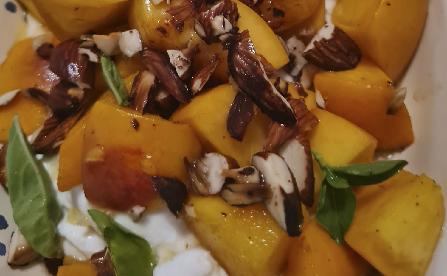 Fried peach salad with burrata, mint and roasted almonds