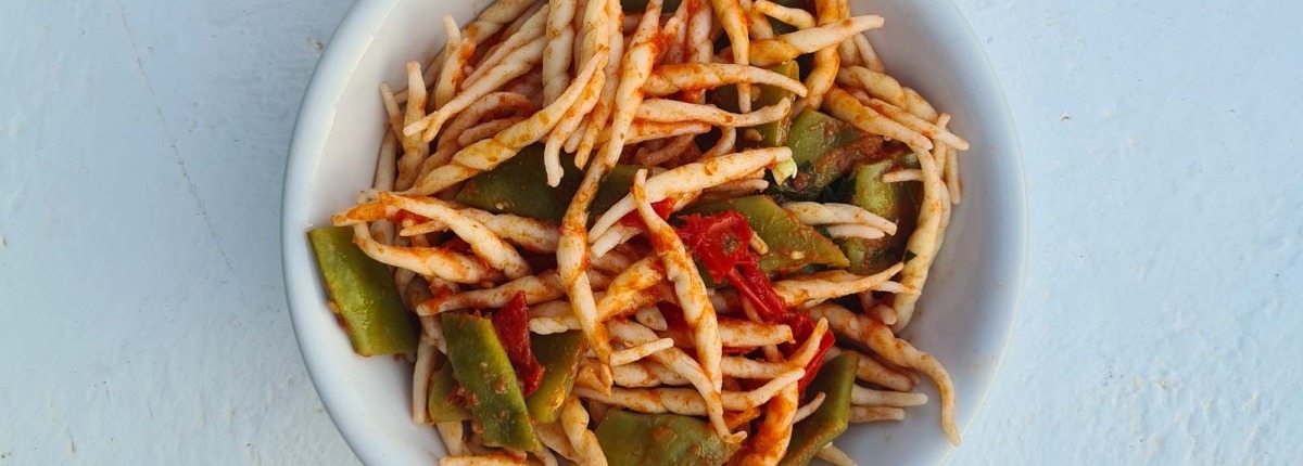 Strozzapreti with Flat Beans in Tomato Sauce