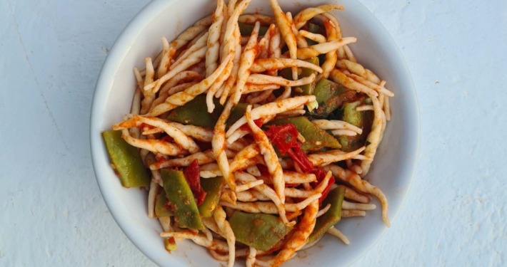 Strozzapreti with Flat Beans in Tomato Sauce